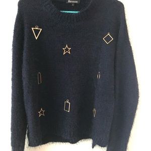 sweater with abstract charms